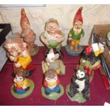 Nine garden gnomes of various size and design including terracotta and plaster examples - various