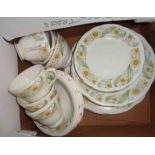 A box containing a quantity of Duchess bone china tea and dinner ware in the Greensleeves pattern