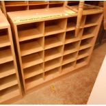 Two similar 1.0m modern mixed wood shop pigeon-hole display/storage units, each with twenty spaces