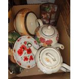 A box containing a quantity of ceramic items including teapots, plates, bowl, miniature items, etc.