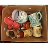 A box containing a quantity of Dartmouth pottery including gurgle jugs, cat figurines, etc. and a