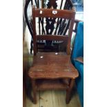 A vintage mahogany metamorphic libray steps/chair with curved top rail and cabriole front supports