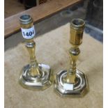 A pair of 18th Century English brass candlesticks