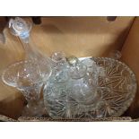 A box containing a quantity of assorted glassware including cut glass vases, jug, decanter, etc.