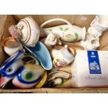 A box containing a quantity of assorted ceramic items including Wade Dickensware vases, boxed