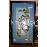 A box frame containing a Japanese 3D picture depicting a female archer in coloured plastic and