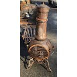 A large cast iron chimenea