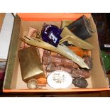 A box containing a quantity of collectable items including carved wooden figures, Eastern brass