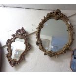 Two Rococo style gilt framed wall mirrors
