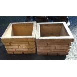 A pair of Sandford Stone concrete planters of square form with brickwork finish