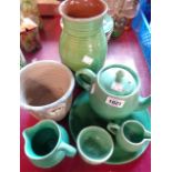 Six pieces of C.H. Brannam pottery including teapot, jugs, etc. - sold with a small studio pottery
