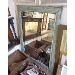 A large modern oblong wall mirror with shabby chic painted frame and distressed plate