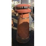 A terracotta chimney pot