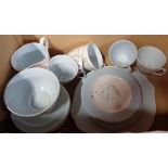 A box containing a small quantity of Queen Anne bone china teaware comprising five trios, milk and