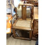 A pair of Chinese rosewood framed elbow chairs with plank splats and woven rush seat panels, set