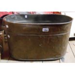 A large two handled copper planter - one handle missing