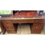 A 1.2m late Victorian stained oak twin pedestal desk with leather inset top, three frieze drawers