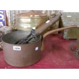 An old copper saucepan with wrought iron handle with stamp mark for Enile Duval - sold with an old