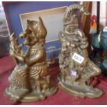 A pair of old cast brass doorstops of Punch & Judy form