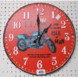 A reproduction printed tin battery wall timepiece with 1961 TT Races decoration