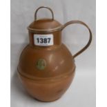 A vintage copper lidded milk can with applied Guernsey badge to front and stamp mark Martin's