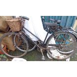 A Robin Hood ladies bicycle with three speed Sturmey Archer gears, front wicker basket and rear