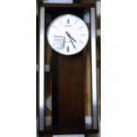 A Seiko QXH068B polished wood cased wall clock with visible pendulum, glazed door and quartz