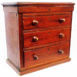 A 36cm Edwardian stained mahogany chest with lift-top compartment and three long graduated drawers