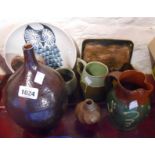 A quantity of studio and craft pottery items including vases, jugs, dishes, etc.