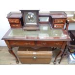 An 97cm mahogany bonheur de jour writing desk with galleried top and superstructure with flanking