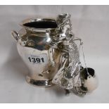 An early 20th Century W.M.F. silver plated spill vase with applied figure depicting a milkmaid