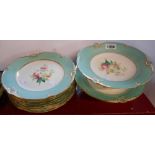 A late 19th Century porcelain dessert set with hand painted floral sprays and a light turquoise