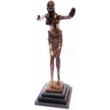 A modern cast bronze effect Art Deco style figure set on hardstone plinth, depicting an exotic