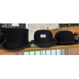 A Gieves top hat - sold with a Lock & Co. riding bowler and a Dunn & Co. bowler hat