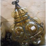 A box containing an iron framed blown bubble glass hanging ceiling lamp and a brass framed hanging
