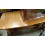 A 90cm wood grain effect two tier coffee table