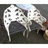 A pair of white painted cast aluminium Coalbrookdale style fern back tub garden chairs with wooden