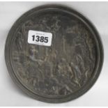 A small cast pewter plaque depicting a classical scene with Trajan's Column in the background
