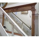 A gilt gesso framed overmantel mirror in the antique style with decorative Corinthian column