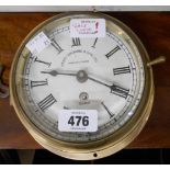 A brass cased bulkhead timepiece, the 15cm diameter dial marked for Henry Brown & Son, Ltd., Barking