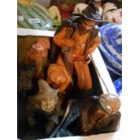 A box containing a quantity of studio pottery figures including Norman Underhill, Bob Overton,