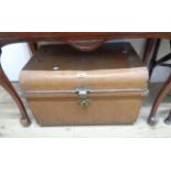 A 61cm vintage painted tin dome top travelling trunk with flanking drop handles