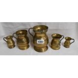 A set of five vintage graduated brass measures of tankard form