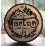 A modern painted cast iron Norton motorcycles sign