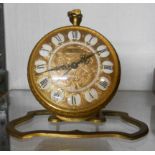 A reproduction gilt metal cased pocket watch style timepiece with dial marked 'Ernest Borel,