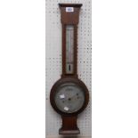 An early 20th Century oak cased barometer/thermometer with printed dial marked for Z. Baraclough &