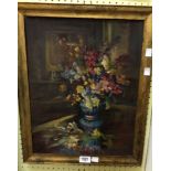 M.L. Lubbard: an antiqued gilt framed oil on board still life with vase of flowers on a table -