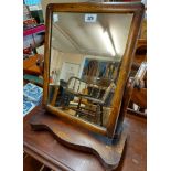 A Victorian mahogany framed platform dressing table mirror, set on serpentine base with bun feet -