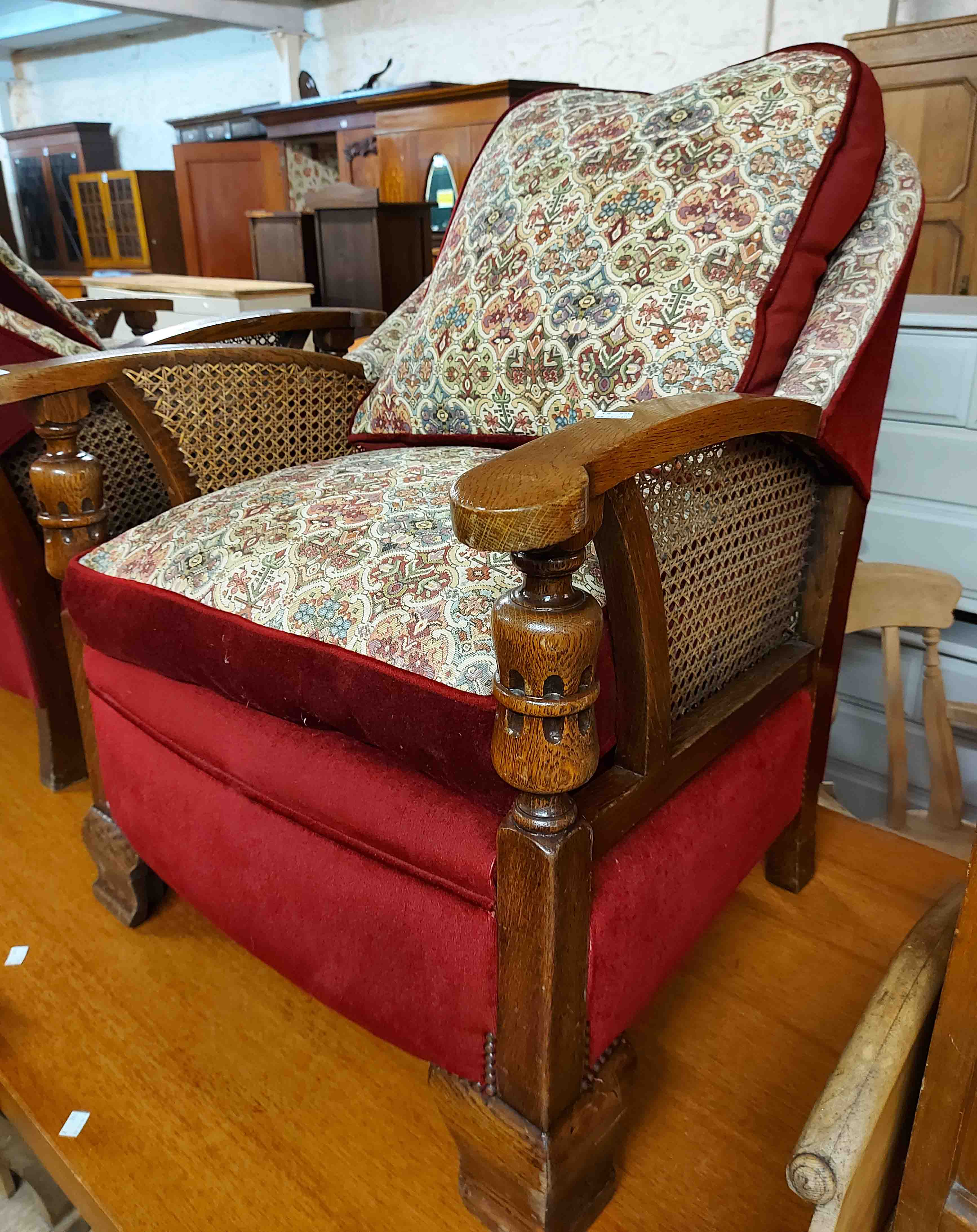 A pair of 20th Century polished oak framed tub back armchairs with bergere side panels and modern - Image 2 of 2