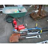 A quantity of assorted garden tools including shovels, shears, etc. - sold with a wheelbarrow and